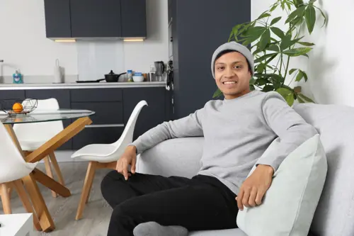 Srekanth relaxing in his living room