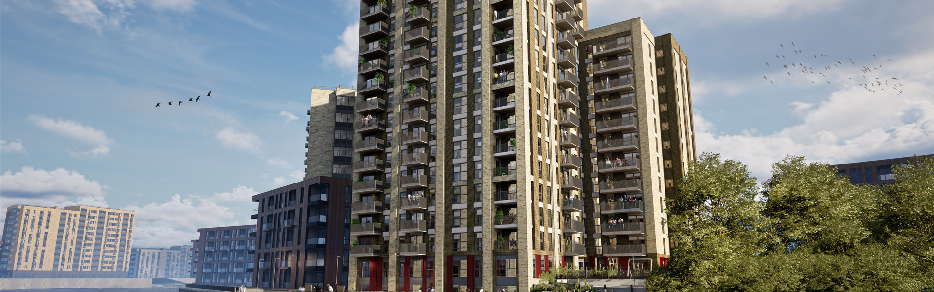 Saxon Wharf external still, featuring waterfront buildings with riverside walkways and views.